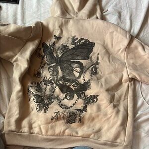 Beige Hoodie with Black Butterfly Design